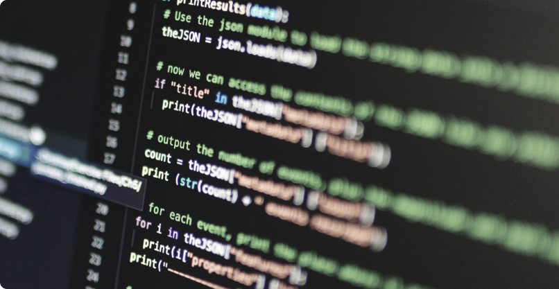 8 West Consulting image of a computer monitor with code on the screen representing technical assessments and impact engagements